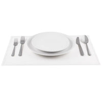 White organic cotton placemat with formal table setting, plates and silverware arranged