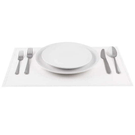 White organic cotton placemat with formal table setting, plates and silverware arranged