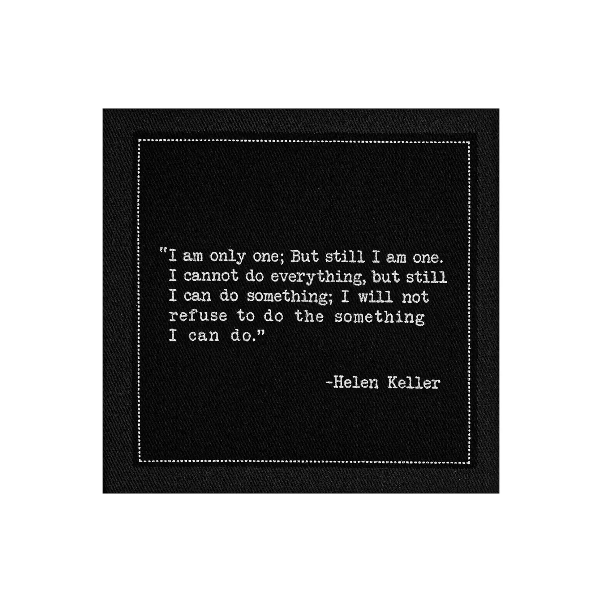 Anthracite Grey organic cotton napkin with Helen Keller quote, stitched border, unfolded