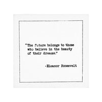 Organic cotton napkin with printed quote 'The future belongs to those who believe in the beauty of their dreams.'