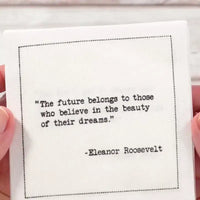Video close-up of an organic cotton cocktail napkin printed with the quote “The future belongs to those who believe in the beauty of their dreams,” – Eleanor Roosevelt, from Five Star Napkins’ Women Leaders quote collection.